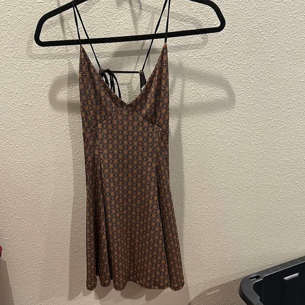 Cute Bronze and black mini sundress. Size Small.